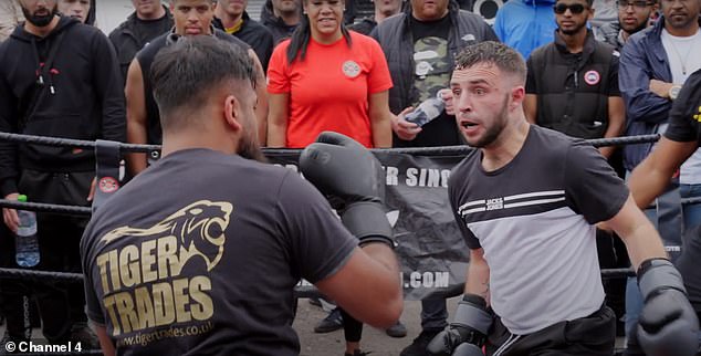 Illegal 'no rules' fight clubs are flourishing across Britain - with the violent events fueled by millions of sadistic viewers on TikTok.  Pictured: A fight taking place at the King of the Ring fight club in Manchester