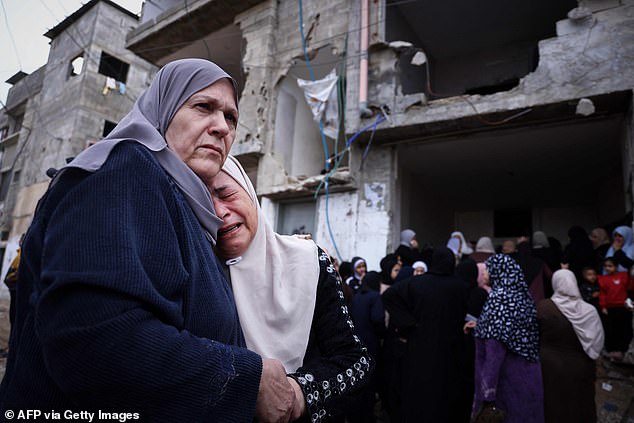 Palestinian mourners attend the funeral of six Palestinians killed in clashes with Israeli forces