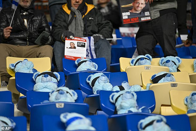 Teddy bears were placed on the seats of the Israeli section for their match against Romania on Saturday