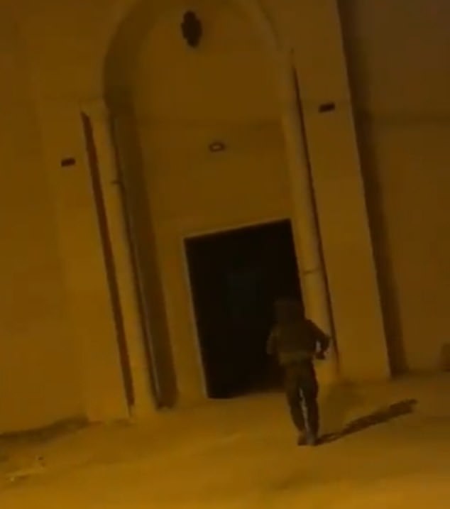 Footage shows an Israeli soldier walking towards a mosque in the Palestinian West Bank before throwing a grenade at the building