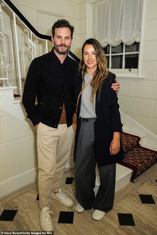 Cute couple: Jamie Dornan looked loved up with his wife Amelia Warner as they socialized at the Twenty Two in London on Tuesday evening