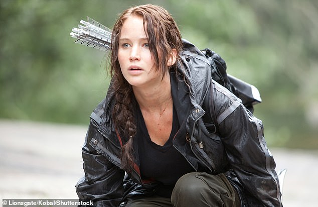 No more: Jennifer Lawrence is unlikely to return to The Hunger Games.  The 33-year-old star played Katniss Everdeen in the first four films of the dystopian sci-fi film franchise, but producer Nina Jacobson says her return is dependent on author Suzanne Collins writing a new novel starring her alter ego.