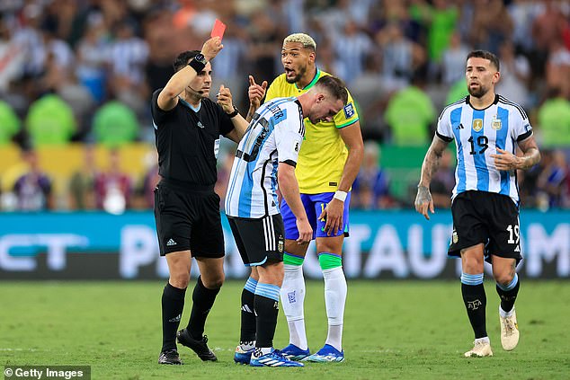 Referee Piero Maza shows a red card to Brazil's Joelinton during a 2026 World Cup qualifier