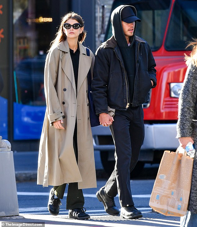 Lovebirds: Kaia Gerber and Austin Butler put on a loved-up show as they held hands while walking through Soho