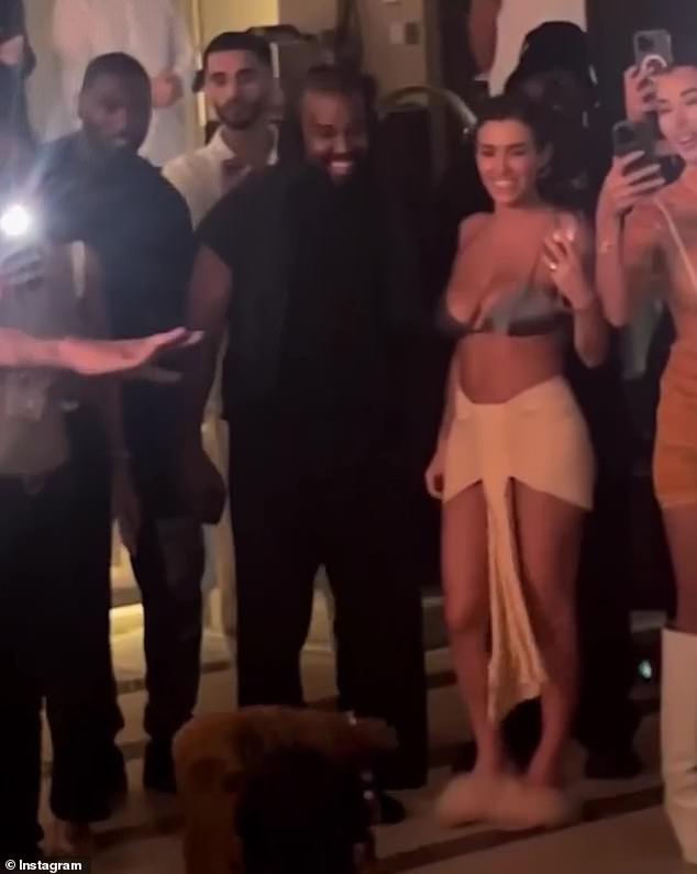 Still in love: Kanye West, 46, reunites with his wife, Bianca Censori, at a party in Dubai after a video of the event surfaced on social media Thursday