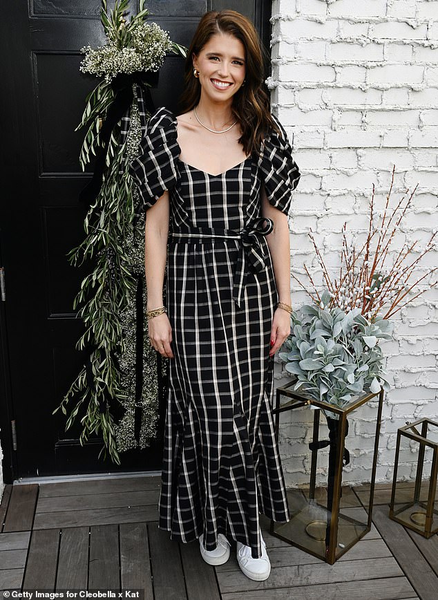 Pop-up store: Katherine Schwarzenegger, 33, beamed as she wore a dress of her own design at the opening of the pop-up store promoting her collaboration with retailer Cleobella Saturday in Los Angeles' Pacific Palisades neighborhood