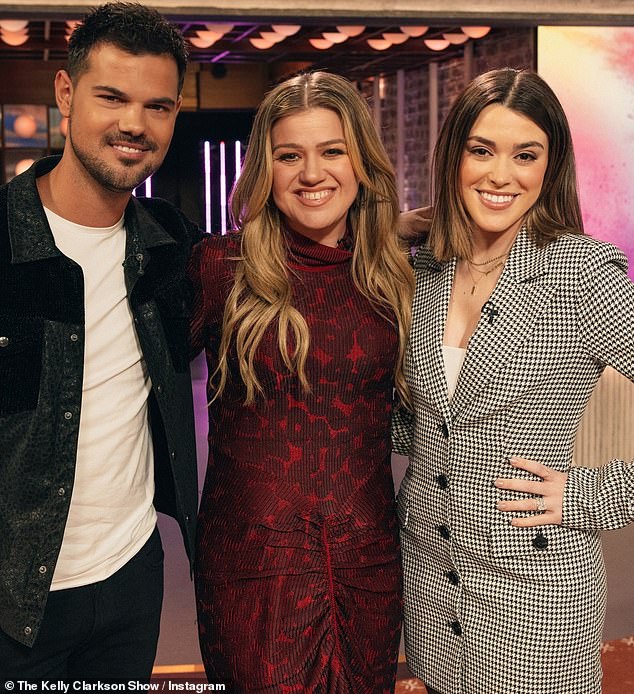 Red-y for her close-up: Kelly Clarkson looked fantastic during her talk show on Wednesday.  The 41-year-old singer, who has slimmed down this year, wore a red Christmas dress with matching red nails.  Her guests were Taylor Lautner and his wife, also named Taylor