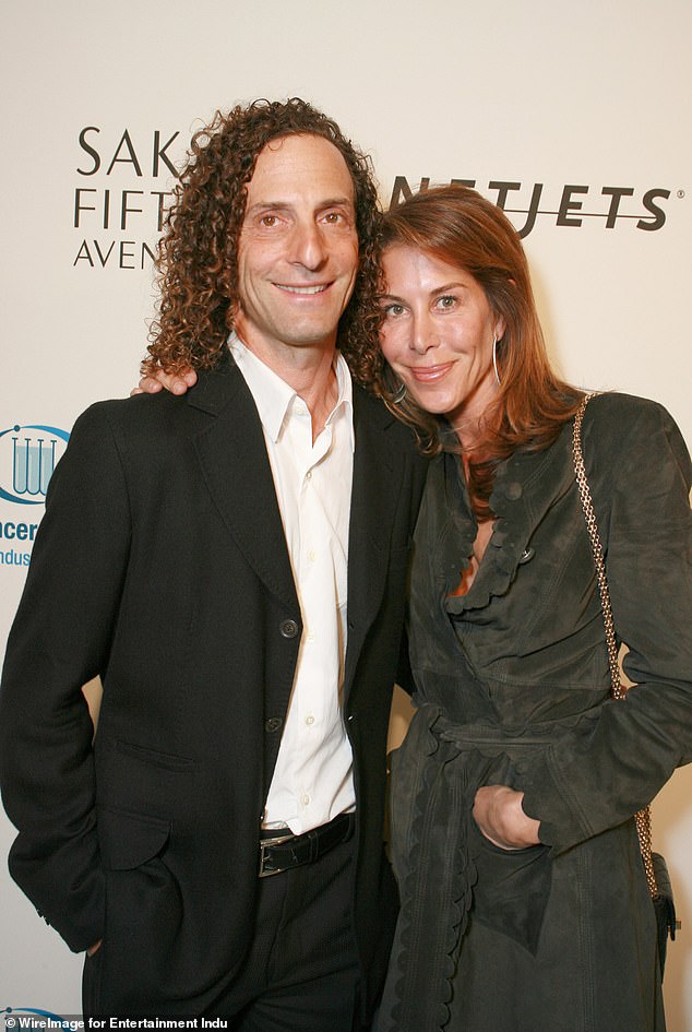 Legal Troubles: Kenny G and his ex-wife, Lyndie Benson, are reportedly embroiled in a contentious legal battle as he attempts to renegotiate the terms of their 2012 divorce;  pictured in 2006