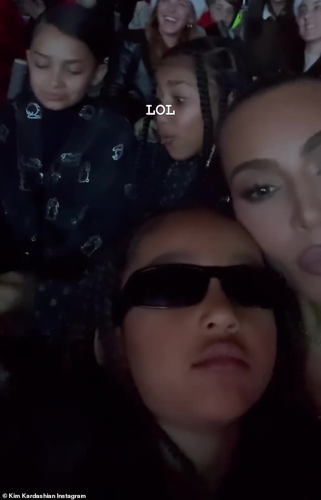 LOL: Chicago, five, seemed to have fallen asleep for part of the show.  Kim wrote LOL about a video shared on social media as North, 10, and a friend rocked out on the seats behind her to Sleigh Ride while taking their own selfie video