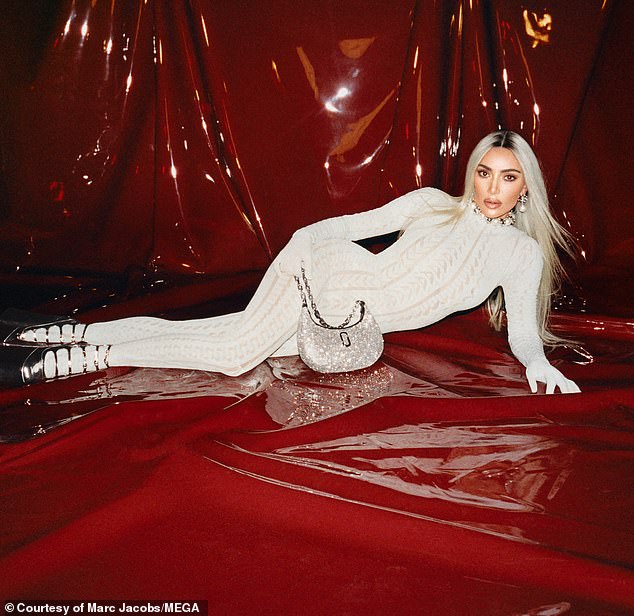 Ferocious: Kardashian ended up changing into a white bodysuit with a pattern that highlighted her statuesque physique