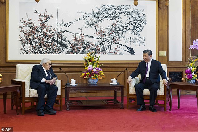 Chinese President Xi Jinping, right, talks with former US Secretary of State Henry Kissinger during a meeting at the Diaoyutai State Guesthouse in Beijing, Thursday, July 20, 2023