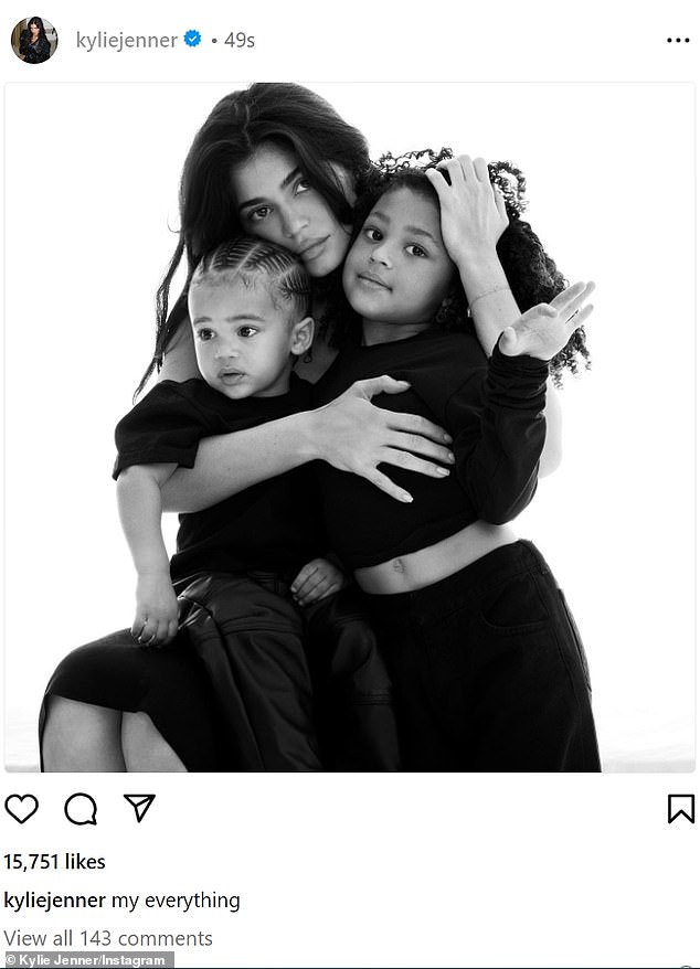 Thank you for family: Kylie Jenner, 26, marks her Thanksgiving with a black and white photo of herself with her arms wrapped around her son Aire, one, and daughter Stormi, five