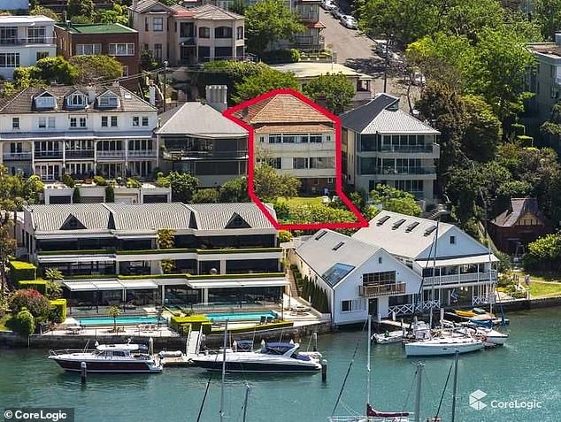 A 115-year-old house (circled in photo) in Sydney's exclusive suburb of Lavender Bay is being demolished