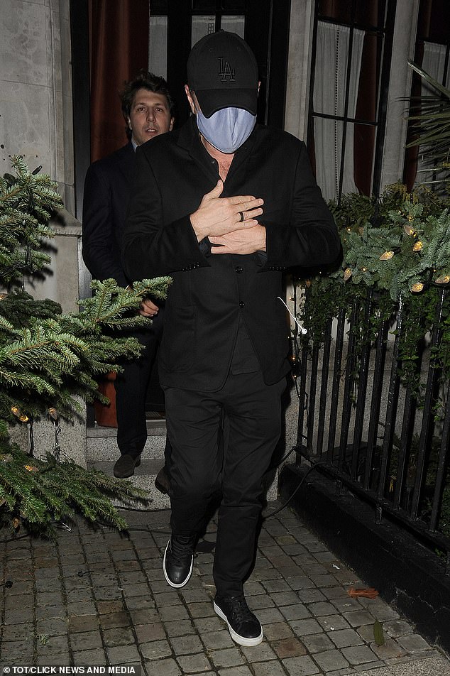 Quiet: Leonardo DiCaprio put on a low-key display as he stepped out of the Chiltern Firehouse in London on Thursday evening