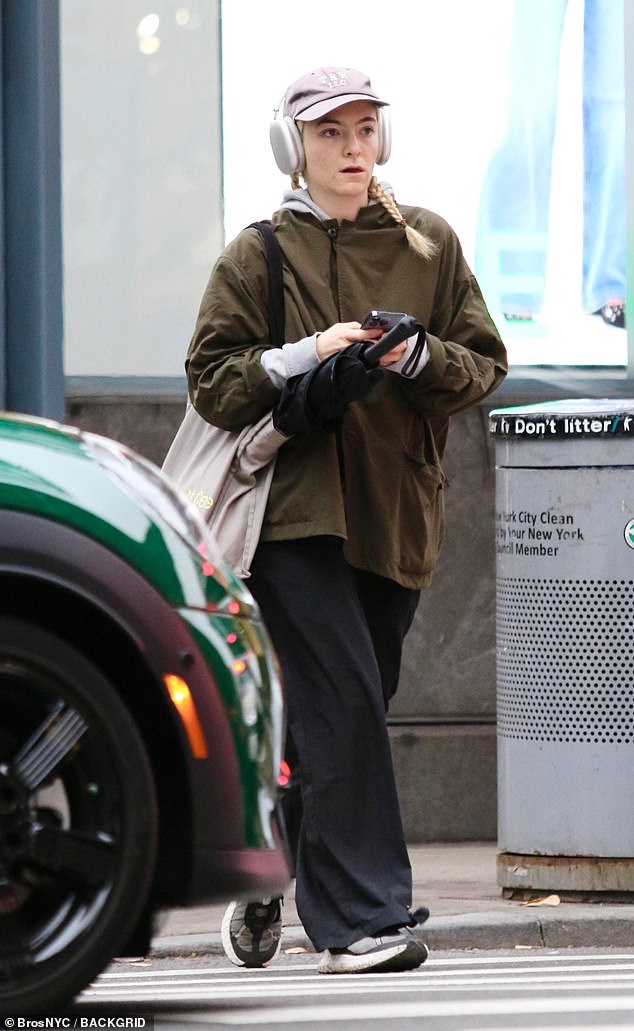 New Zealand singer-songwriter Lorde, 27, (pictured) looked unrecognizable on Sunday as she went completely makeup-free during a rare outing in Downtown Manhattan