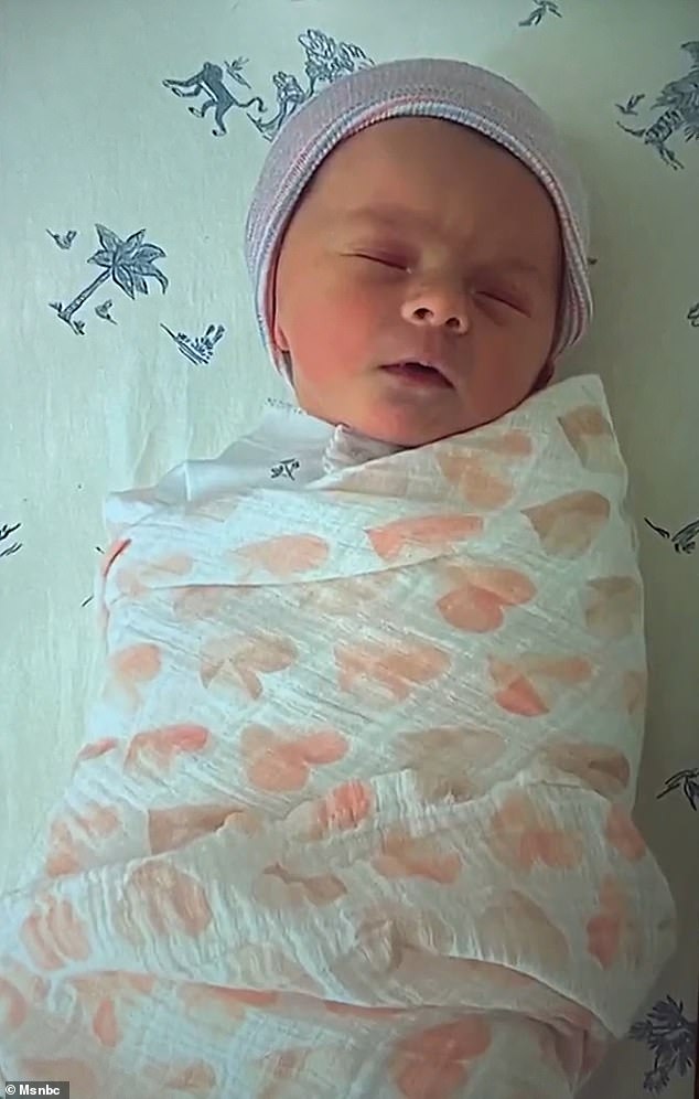 Nicolle Wallace, 51, said she and husband Mike welcomed a baby girl, Isabella Sloane Schmidt (pictured), via surrogate