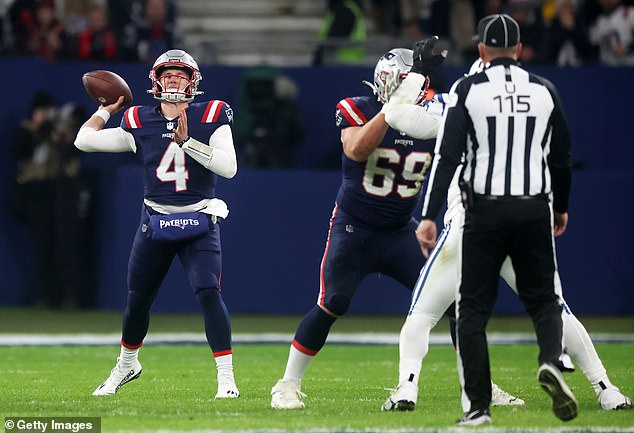 Jones was eventually replaced by backup quarterback Bailey Zappe (4) after an interception.