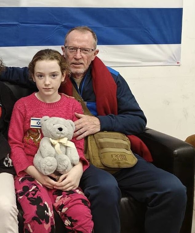 Released hostage Emily Hand found herself at the center of a diplomatic row between Israel and Ireland just hours after being reunited with her father (pictured together)