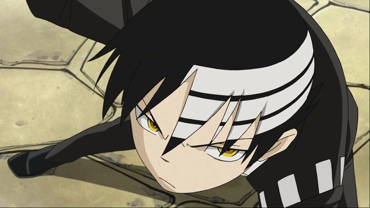 An image of Death the Kid in Soul Eater.  You can see his hair cut, with three white stripes at the top.