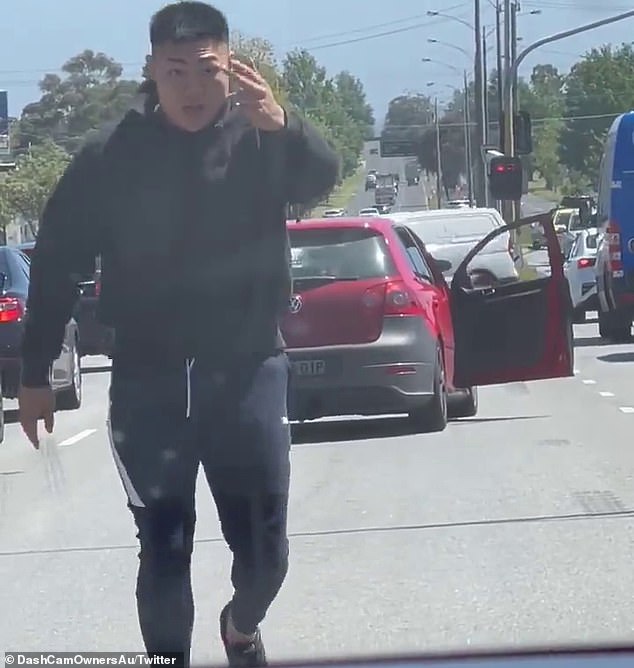 An alleged road rager with a 'rat tail' hairstyle has been shocked after shouting at a terrified motorist on a busy road