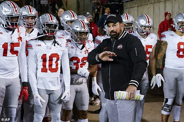 OSU coach Ryan Day (right) is accused of launching an investigation into the rival Wolverines