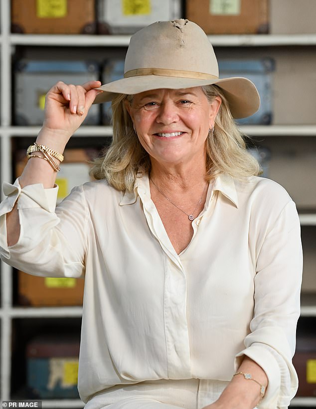 It is believed that Ms Forrest will take on the leadership role in the company, claiming her focus is on protecting and strengthening Akubra's legacy (pictured, wearing her late father's Akubra hat)