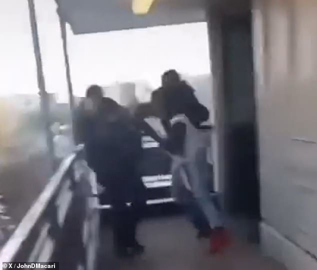 Kareem McClary, 23, and Izayiah Jessamy, 20, smoked cigarettes on the platform of the Freeman Street subway station Monday afternoon with a third, unidentified man.