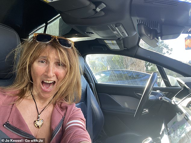 Travel writer Jo Kessel buckles up next to an empty driver's seat for the ride of her life – in a robot taxi