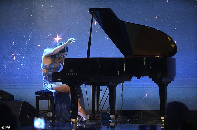 Impressive: The 45-year-old singer showed off her breathtaking piano skills as she took to the stage at The Londoner Hotel on Leicester Square