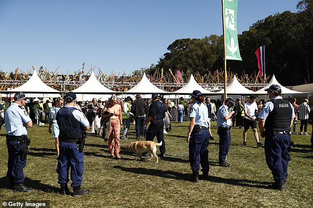 Deadly MDMA pills at twice the average dose are circulating in an Australian state as officials issue an urgent warning as the festive season kicks off (pictured, officers at a festival)
