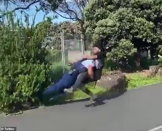 A pro-Palestine supporter was tackled with rugby by a police officer after allegedly throwing a bottle at police during a protest at Auckland Harbor on Thursday