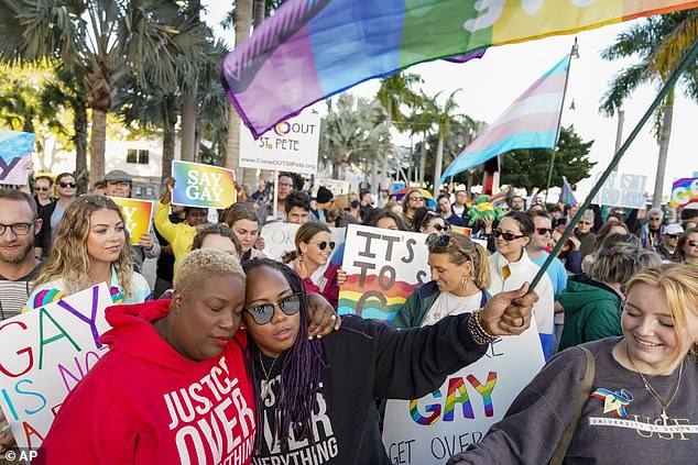 A non-binary Florida teacher who was fired for using an Mx honorific at school has filed an unlawful discrimination lawsuit against his employer — as the state's 'Don't Say Gay' law is in an appeals court