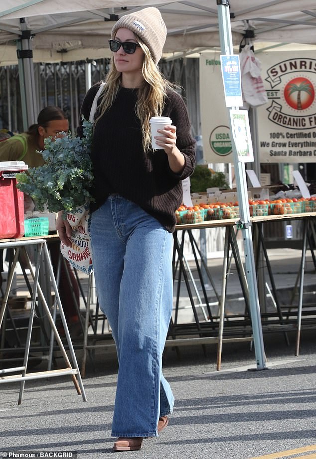 Fall style: Olivia Wilde, 39, showed off her chic fall style as she stepped out to pick up some supplies at a local farmers market in Los Angeles on Sunday