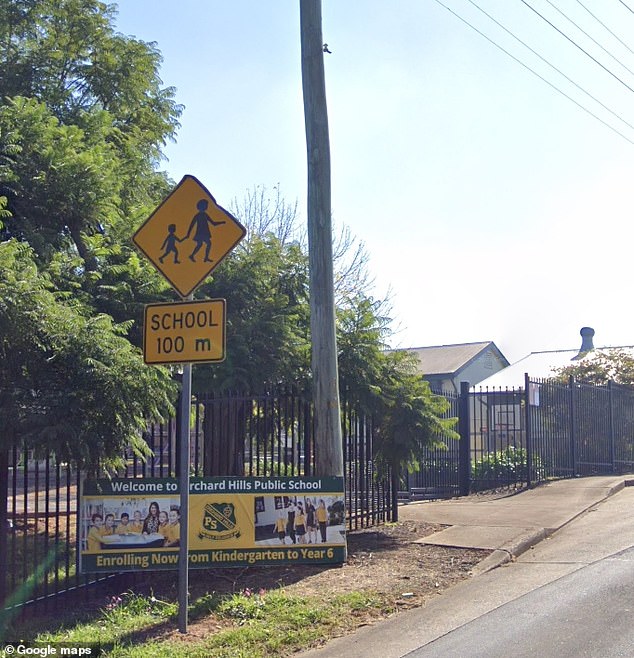 Hundreds of children have been evacuated from Orchard Hills Public School (pictured) in Sydney's west after a fast-moving grass fire headed their way