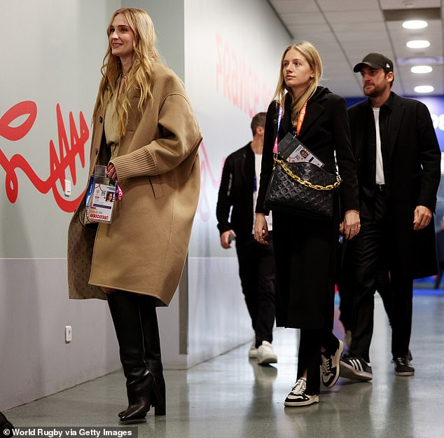 Outing: Just hours after the kiss, Sophie was seen smiling as she and Peregrine both arrived ahead of the Rugby World Cup Final between New Zealand and South Africa