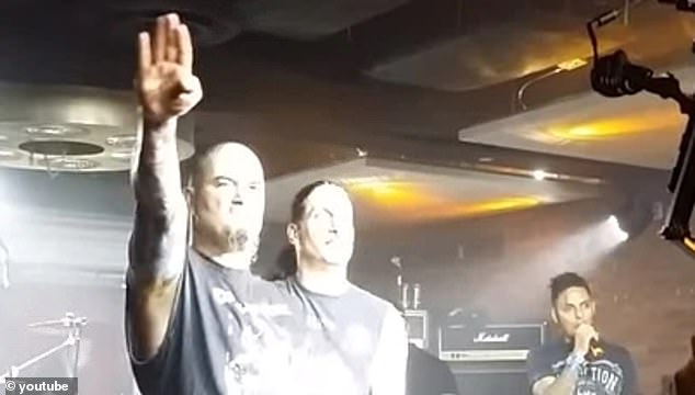 Phil Anselmo (pictured left) gave a Nazi-style salute on stage at a concert in Los Angeles and shouted 'white power'