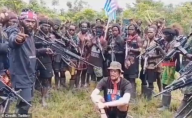 Separatist rebels in Indonesia's Papua region have released a chilling video showing them holding guns to the head of captured pilot Philip Mark Mehrtens.