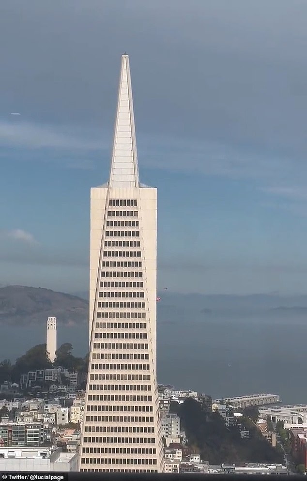 Three people were spotted rappelling down the Transamerica Pyramid building in San Francisco on Monday