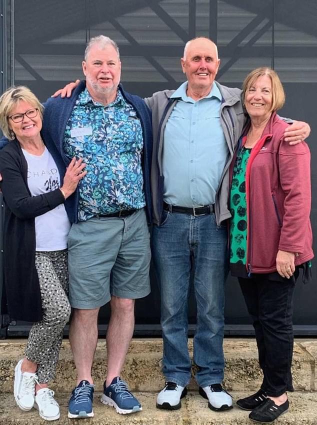 Mr Crocos' wife (second from left) and daughter (left) spent a week with him in hospital awaiting a medical flight