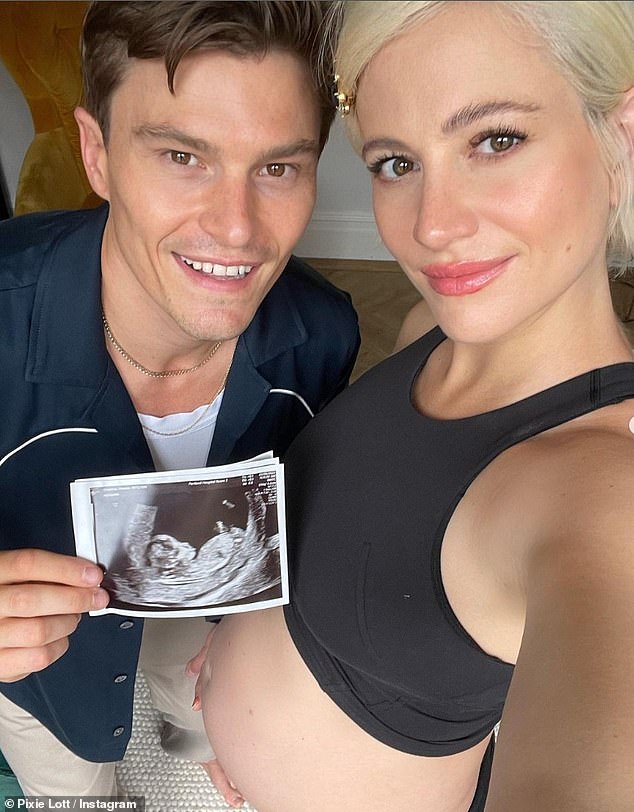 Congratulations!  Her outing comes after Pixie gave birth to her first child with husband Oliver Cheshire