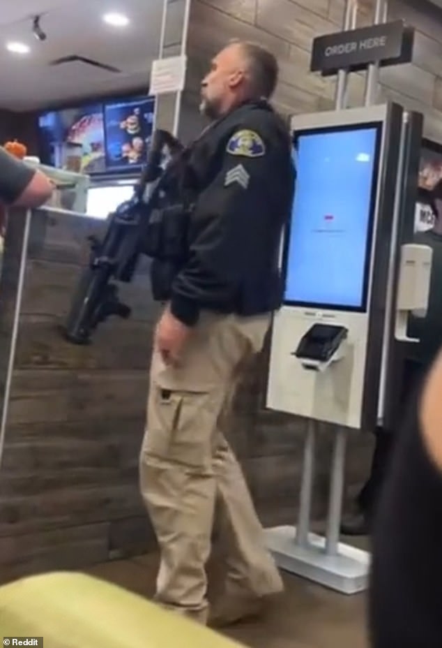 An armed police officer got into a heated argument with a male and a female customer at a McDonald's in McFarland, California