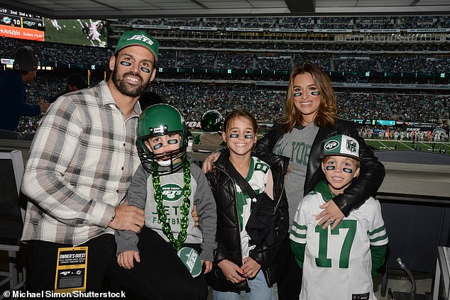 Family Football Friday: The country pop singer attended the Miami Dolphins-New York Jets game in New Jersey with her husband, Eric Decker, and their three children – Forrest, five, Vivianne, nine, and Eric Jr., eight