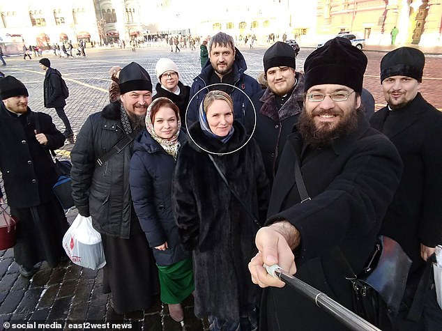 According to reports in Russia, the woman's skull was later found by police in the family's freezer.  Circled is Viktoria who was murdered by priest Mikhail Zubarev (right)