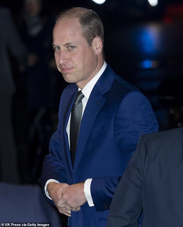 Prince William (pictured) appeared 'tense' and 'struggling with a desire to fight back' upon his arrival at the Tusk Conservation Awards - amid the publication of royal biographer Omid Scobie's new book, a body language expert has claimed