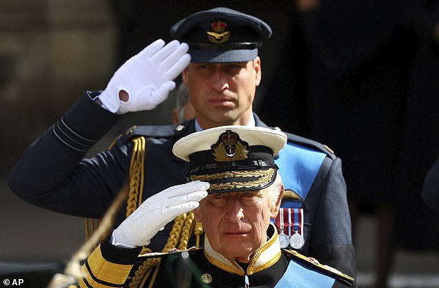 Before Prince Andrew was asked to step down from his royal duties, author says King Charles and Prince William (pictured in September 2022) struggled with the best course of action