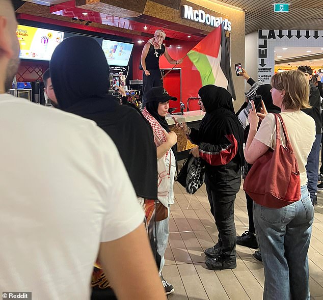 Melbourne Central was flooded with pro-Palestinian supporters on Thursday, including one man who jumped onto the McDonald's counter