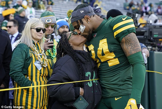 Biles took a break from winning gold medals last week to cheer on his husband at Lambeau Field