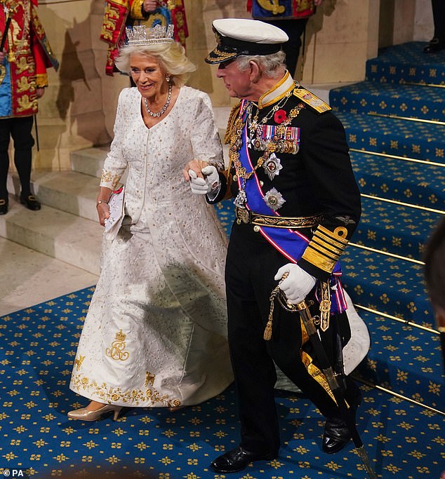 Charles offered emotional support to Camilla today by stroking and caressing her hand reassuringly with his thumb