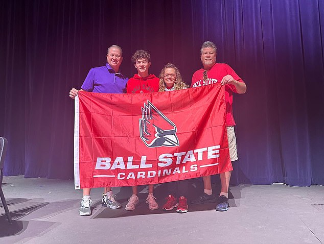 Happy Gilmore (second from left) has signed his letter of intent to join Ball State's golf program