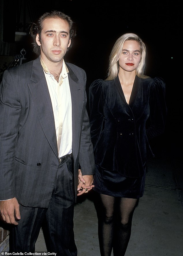 Tough time: Nicolas Cage and ex Christina Fulton haven't met their three-year-old granddaughters amid 'nightmare' legal battle with son Weston Cage's ex Hila Arounian (pictured 1998)